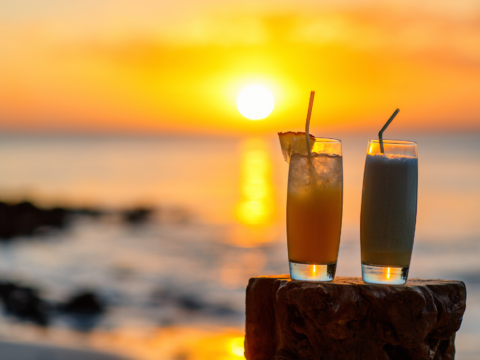 cocktails overlooking beach sunset