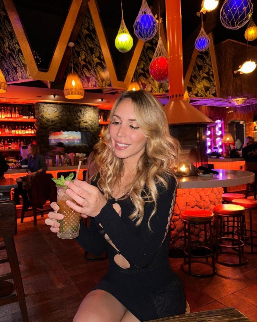 girl drinking cocktail at san diego speakeasy