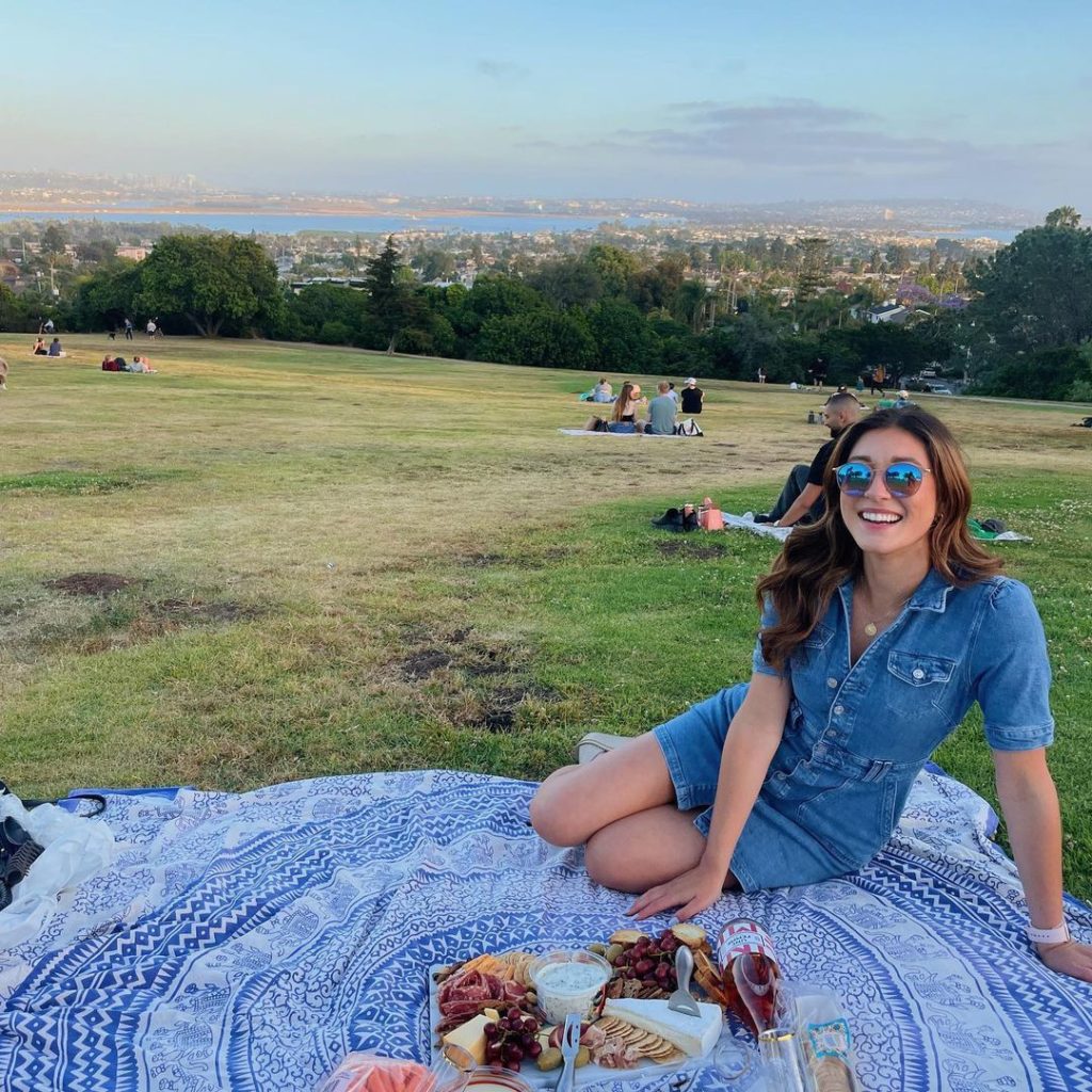 Girl having picnic on Hill