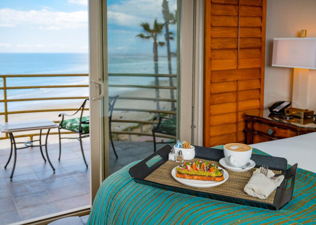 Ocean View room with breakfast on bed