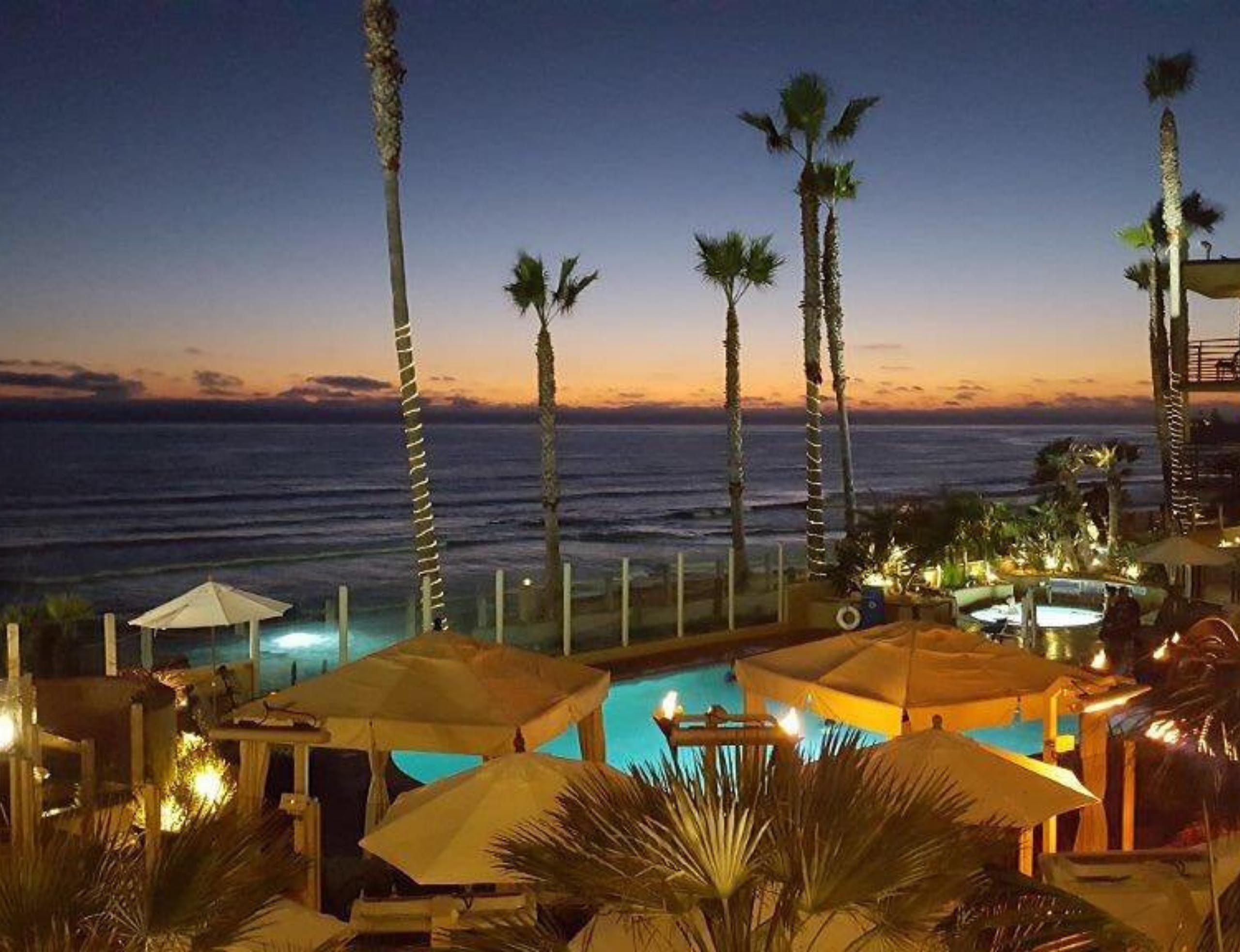 Night view of the pool and beach