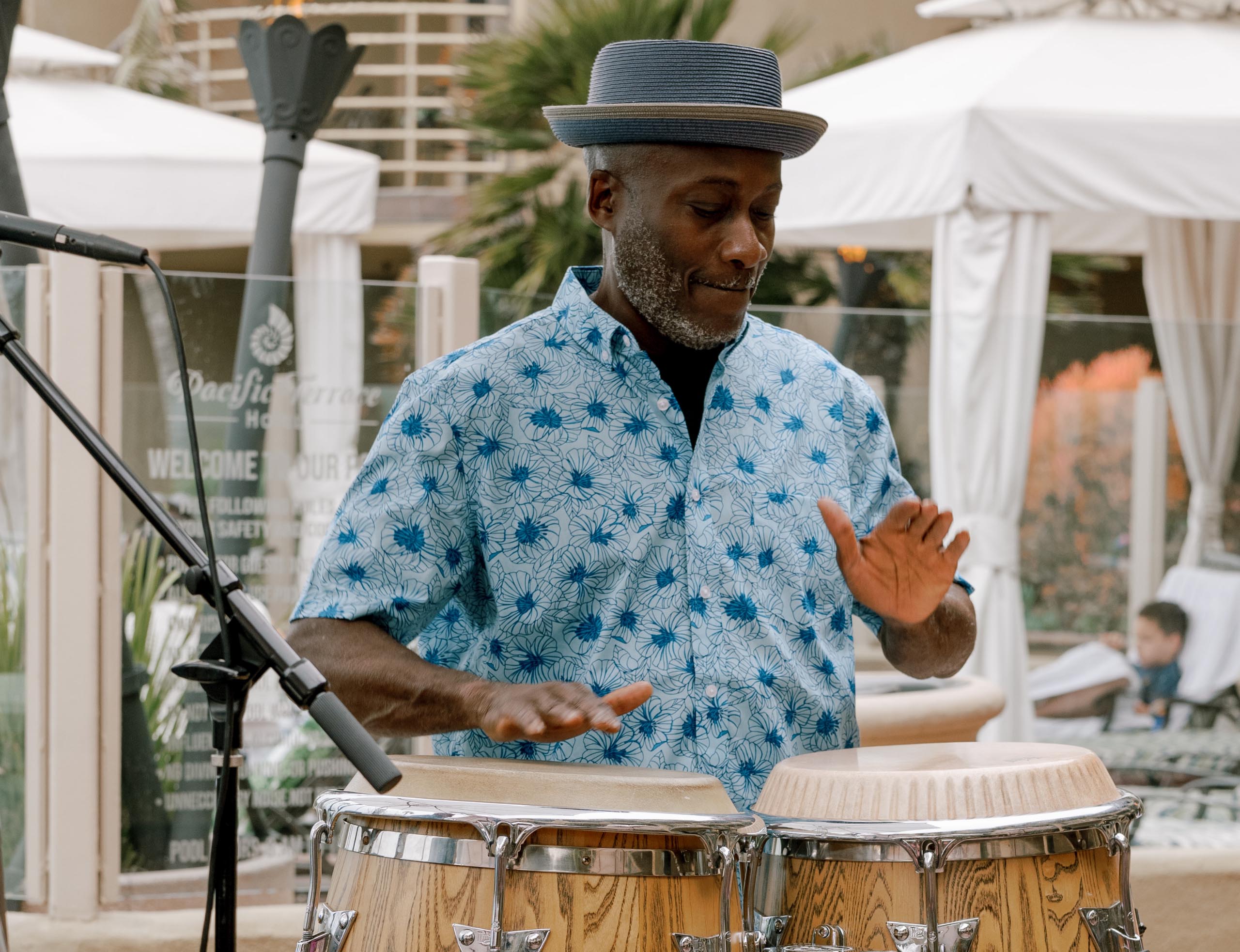 Man enjoying playing steel drums