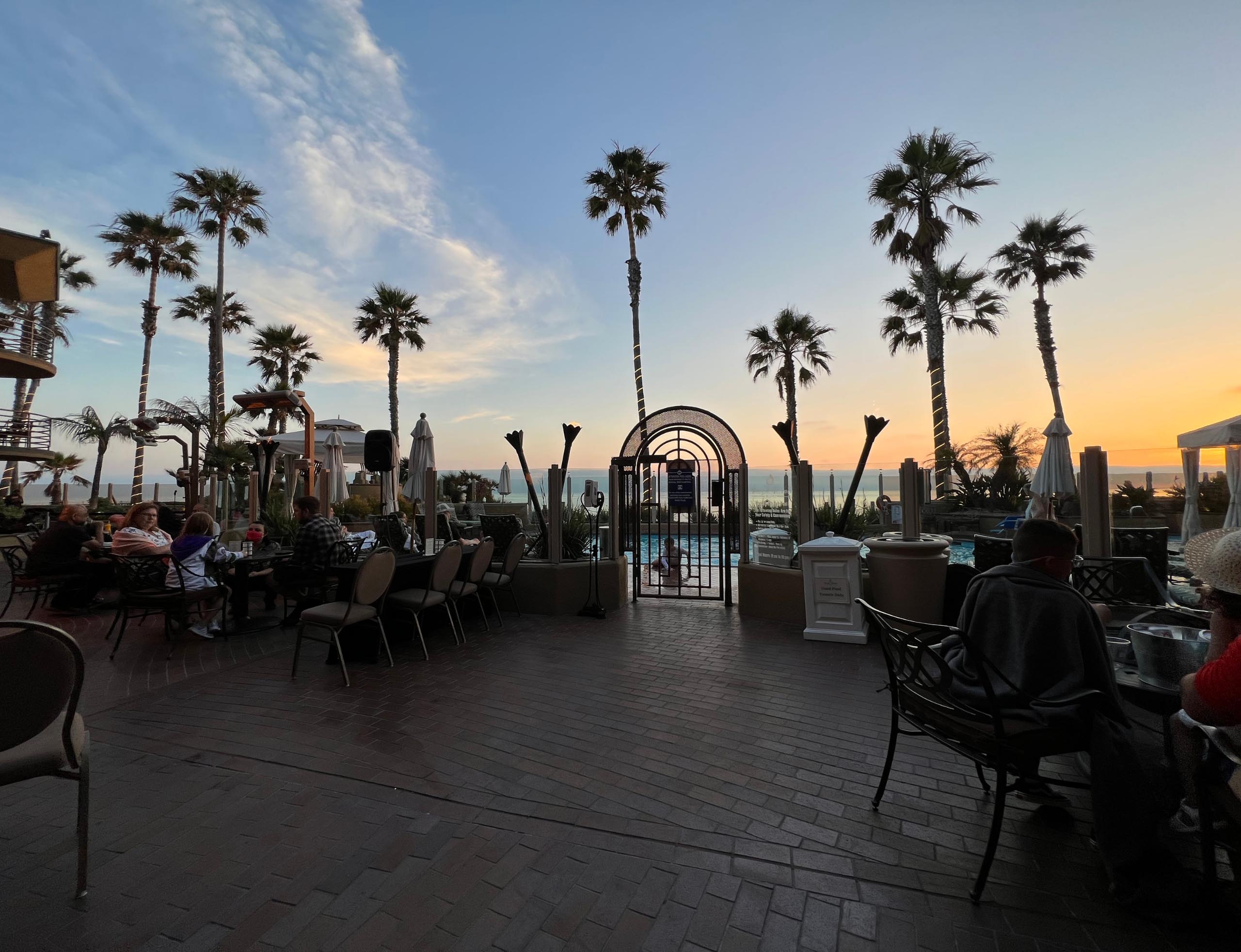 Cafe outdoor seating with the pool view and sunset view