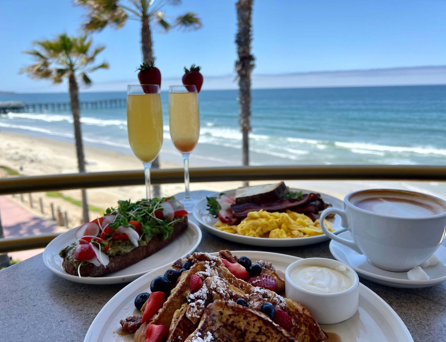 Breakfast on balcony while enjoying the view of pacific beach