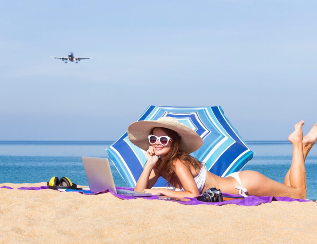 Woman enjoying the sunny weather and beach