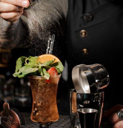 a bartender making cocktails