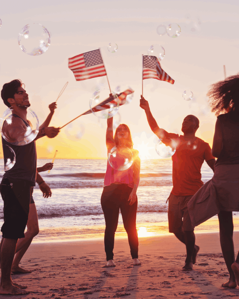 people dancing on the beach