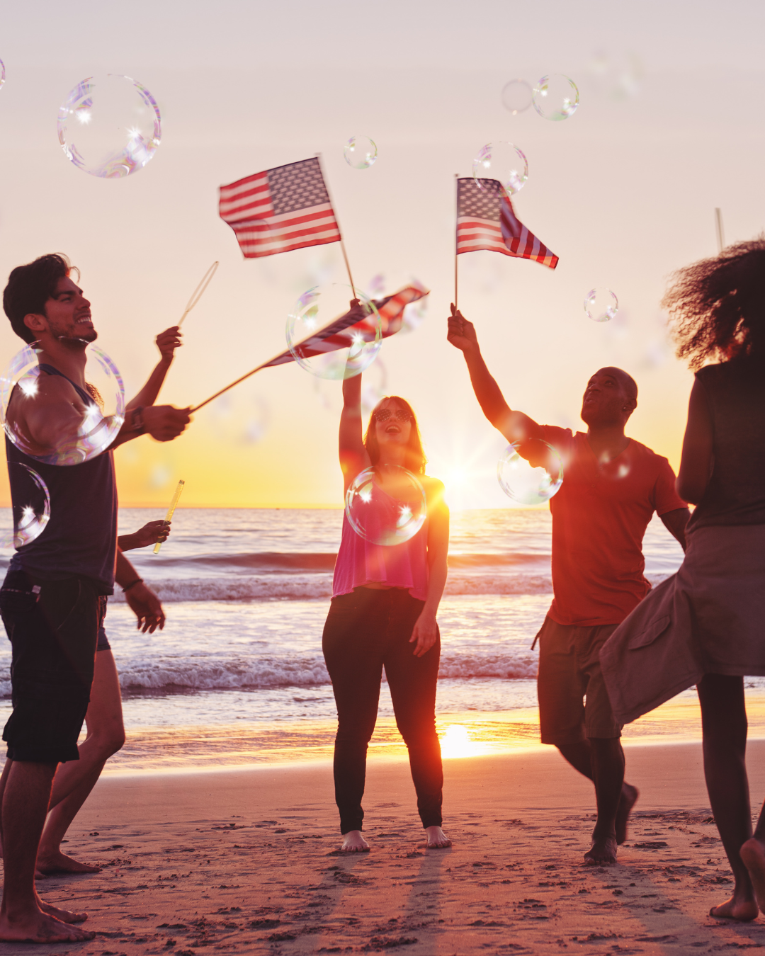 people dancing on the beach