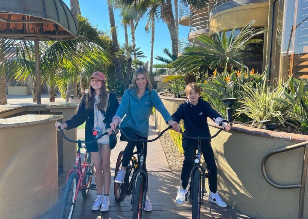 a family getting ready to head off on a bike ride together