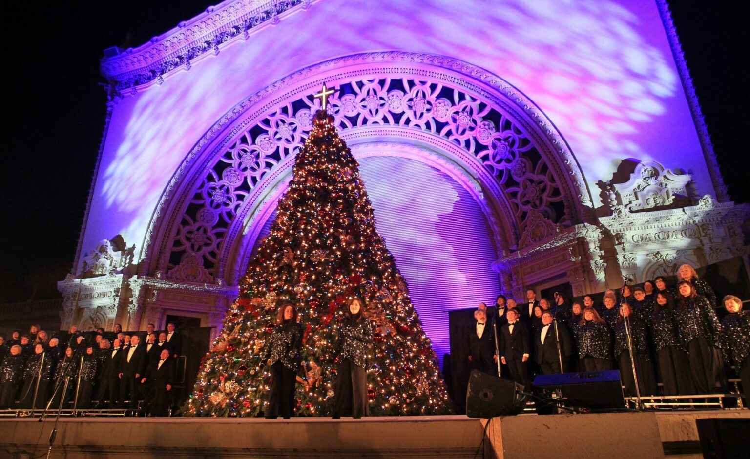 Christmas tree on stage with singers