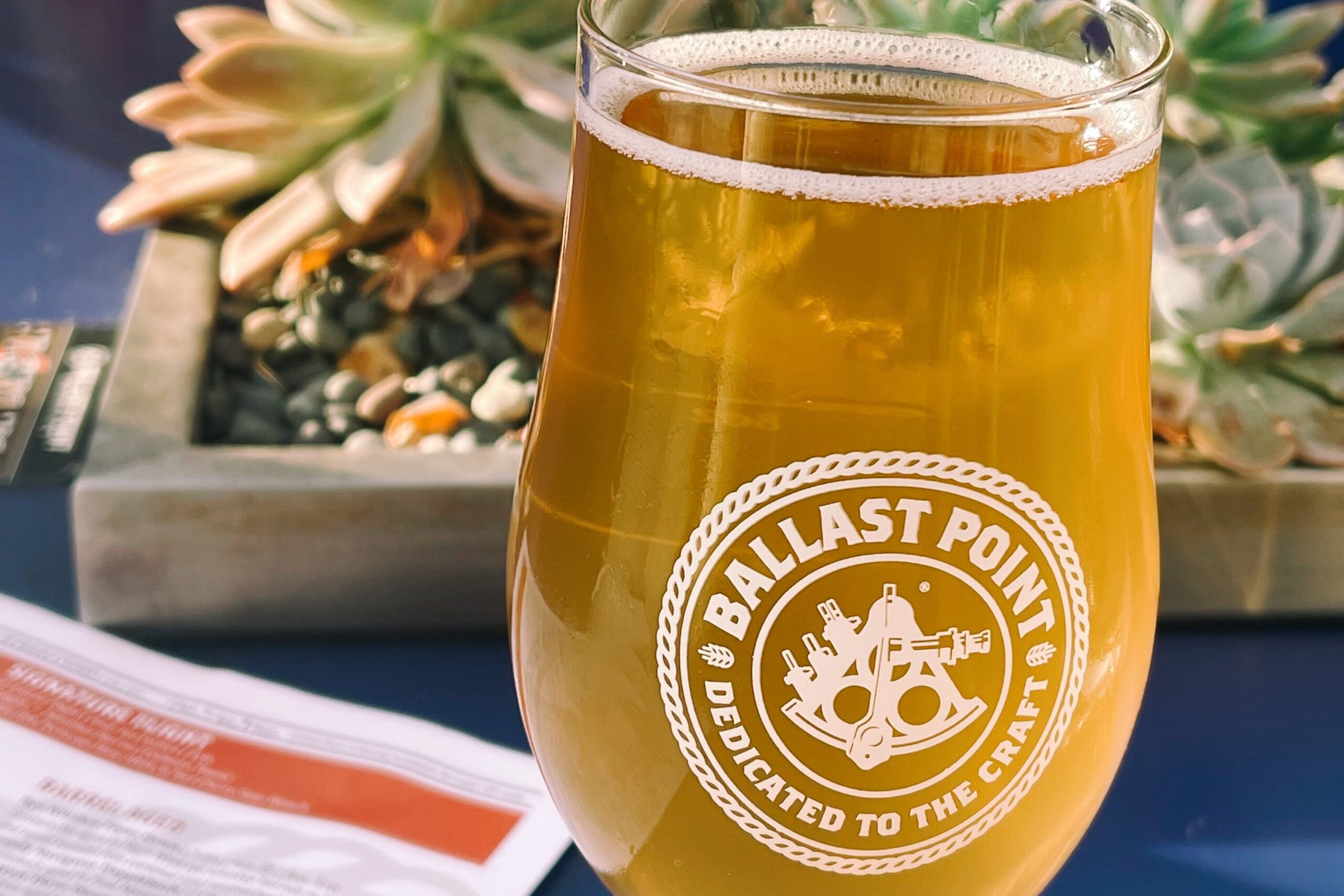 ballast point glass of craft beer