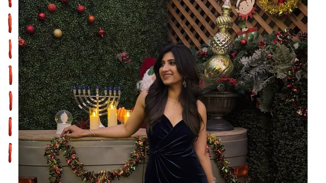 girl standing in front of car